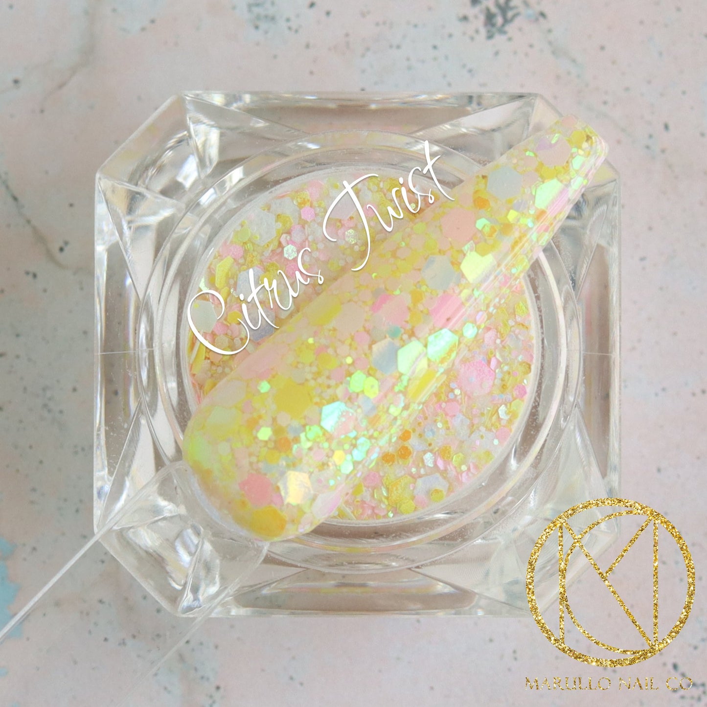 Citrus Twist yellow glitter nail dip powder by Marullo Nail Co