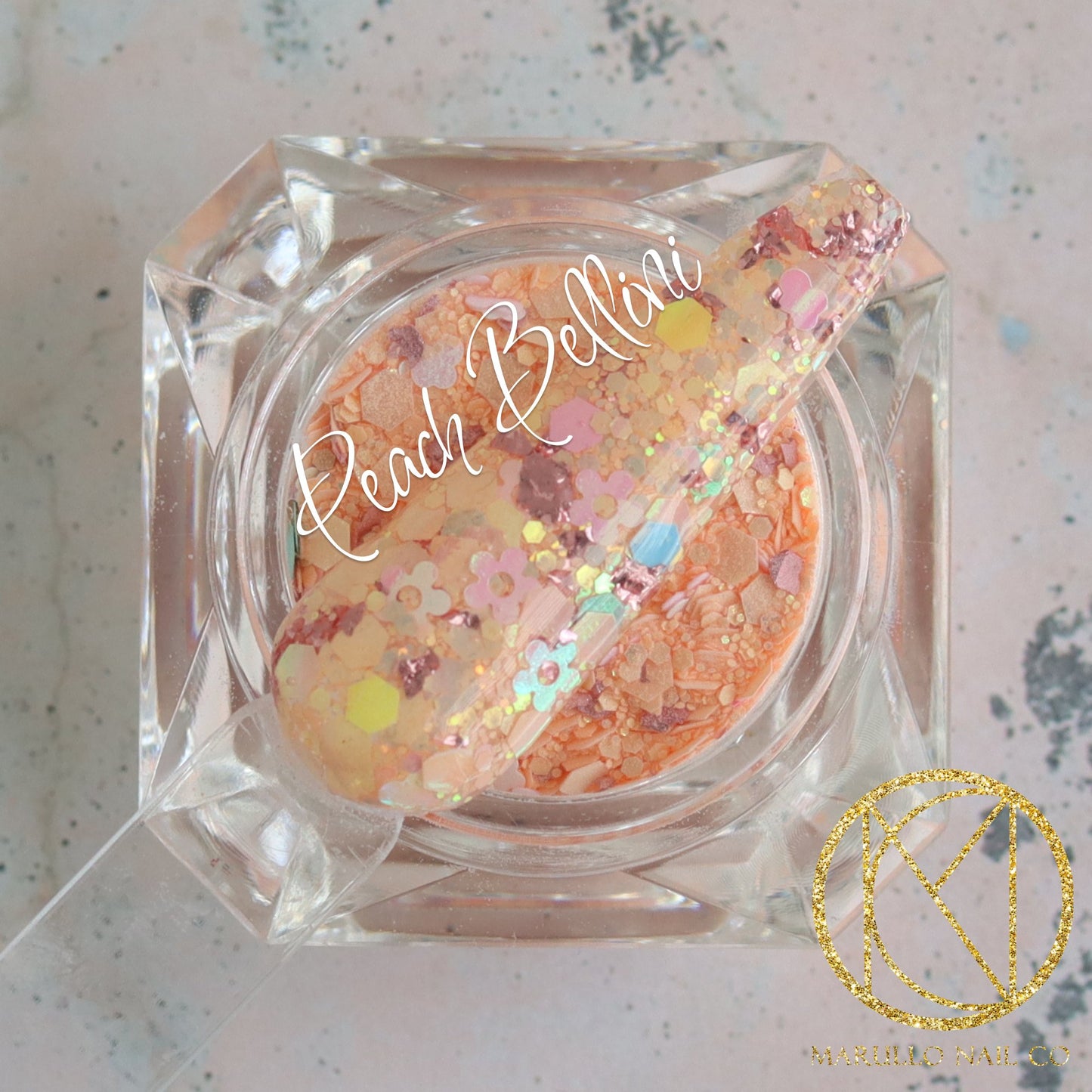 Peach Bellini peach glitter nail dip powder by Marullo Nail Co