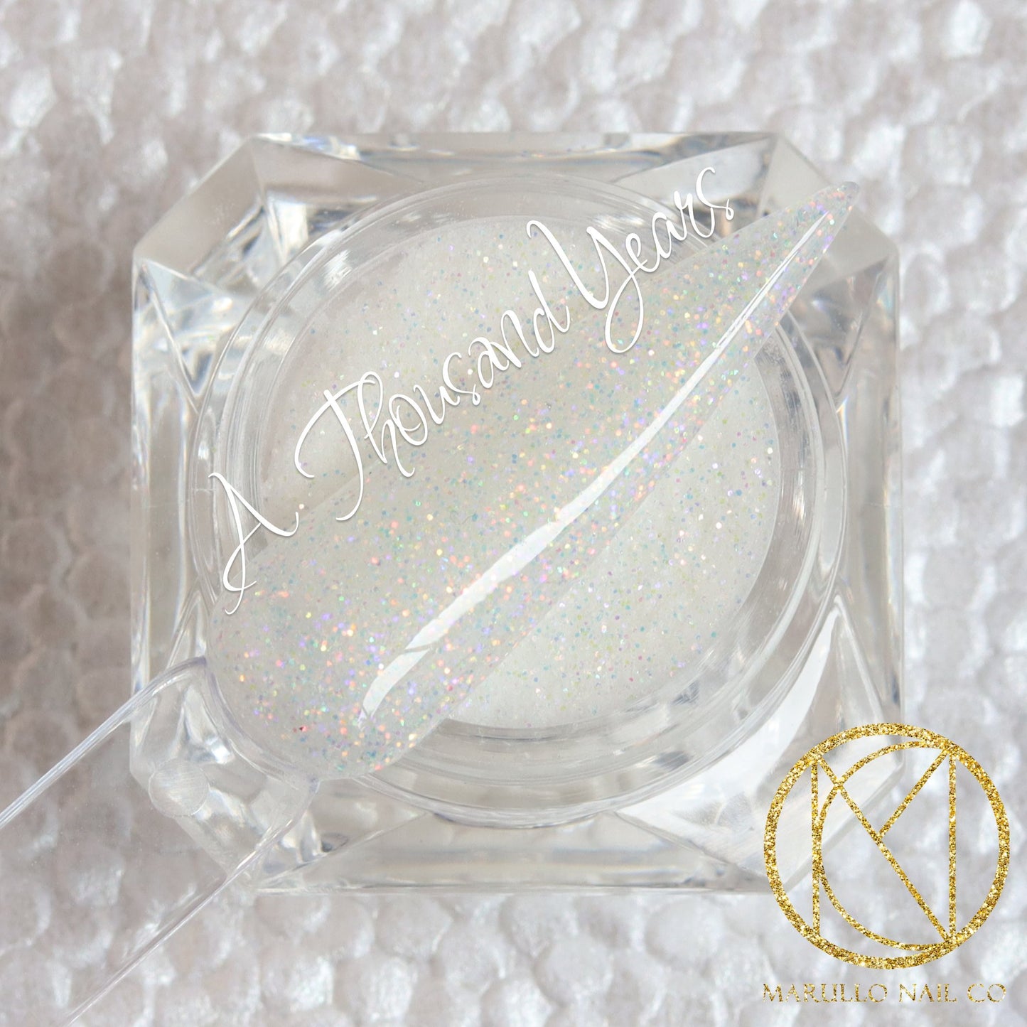A Thousand Years white glitter nail dip powder by Marullo Nail Co