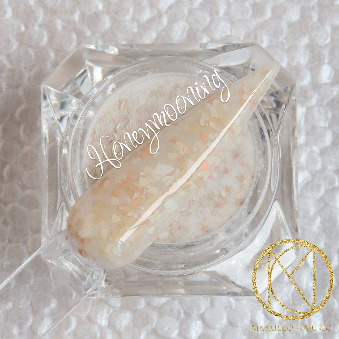 Honeymooning white terrazzo nail dip powder by Marullo Nail Co
