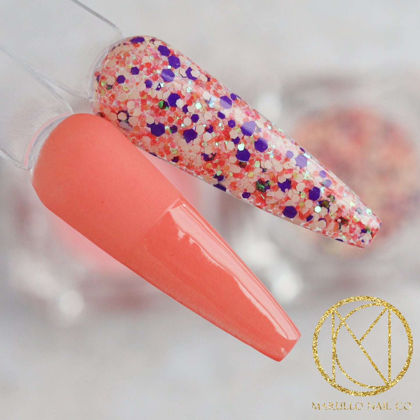 Irresistible orange glitter nail dip powder by Marullo Nail Co