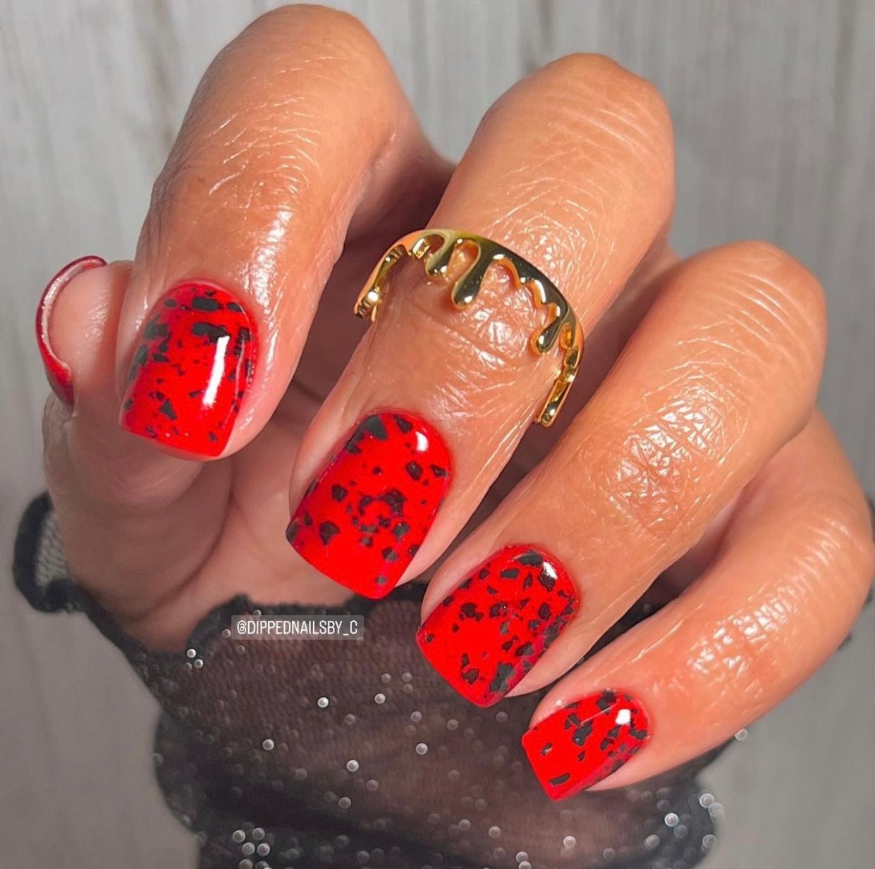 Vamp red terrazzo nail dip powder by Marullo Nail Co